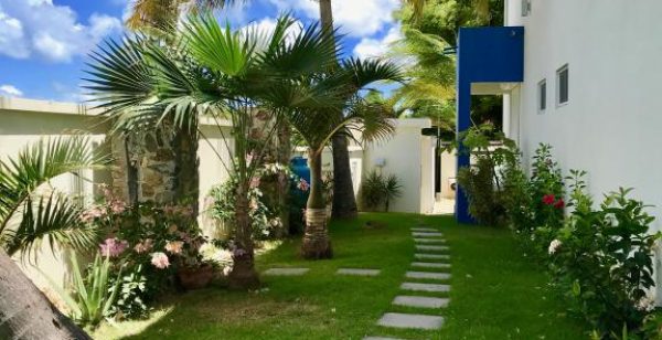  Pathway to the beach, with an outside shower under the trees
 