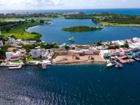 New Construction Cupecoy Waterfront Villa With Boat Dock For Sale