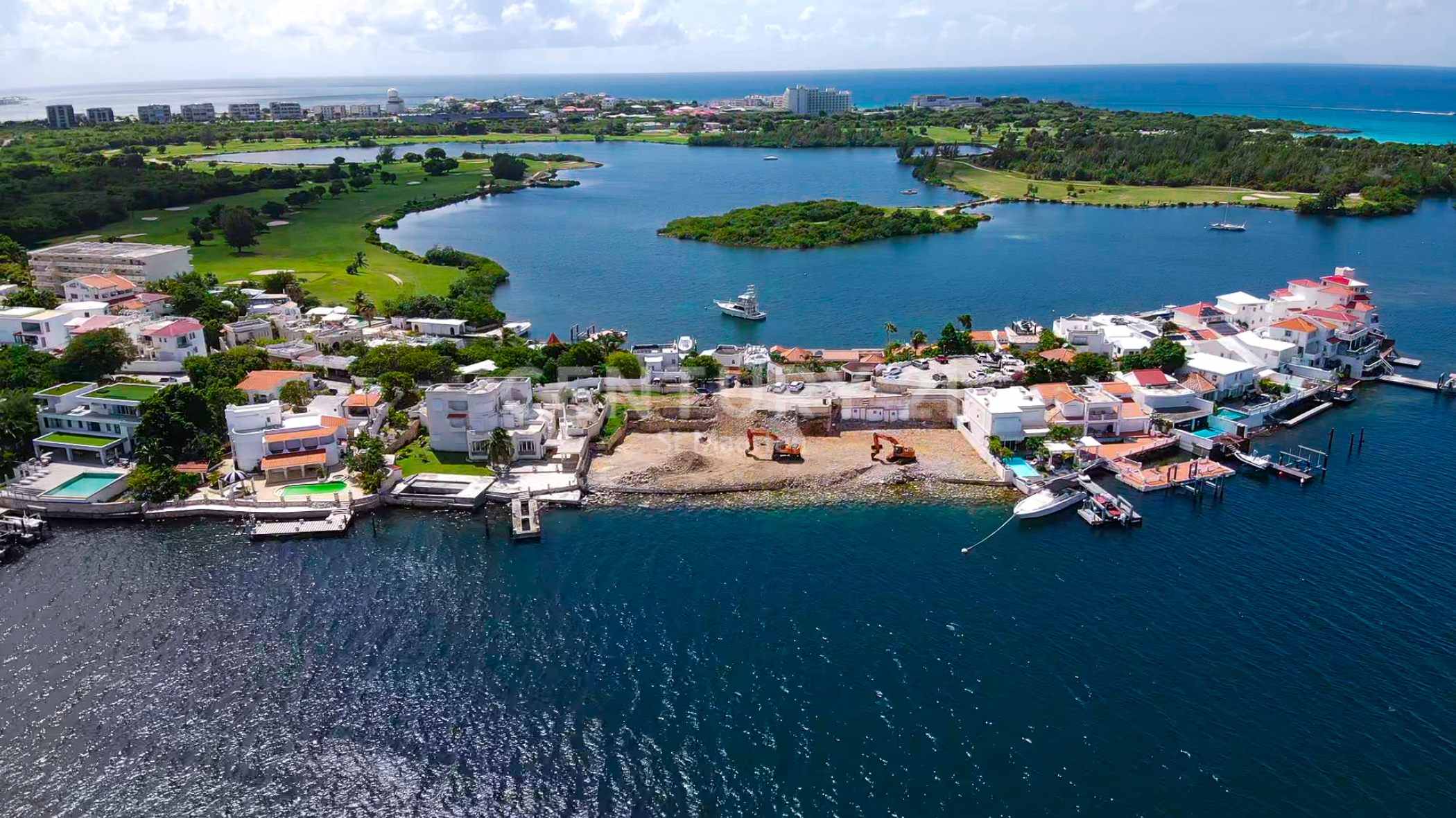 New Construction Cupecoy Waterfront Villa With Boat Dock For Sale