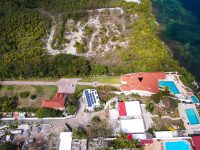 Just Renovated Modern Cupecoy Lagoon Front Villa For Sale