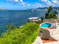 Just Renovated Modern Cupecoy Lagoon Front Villa For Sale