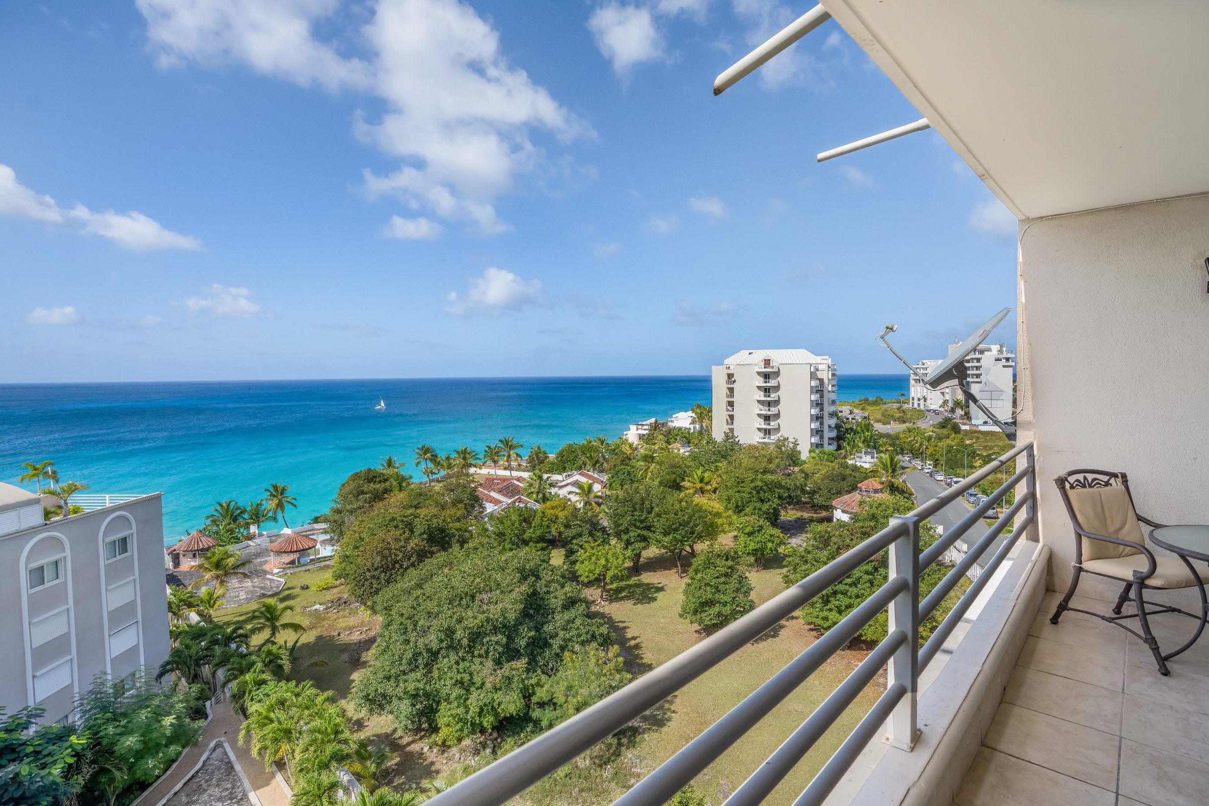 Large Rooftop Rainbow Beach Club St Maarten Condo For Sale