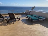 Large Rooftop Rainbow Beach Club St Maarten Condo For Sale