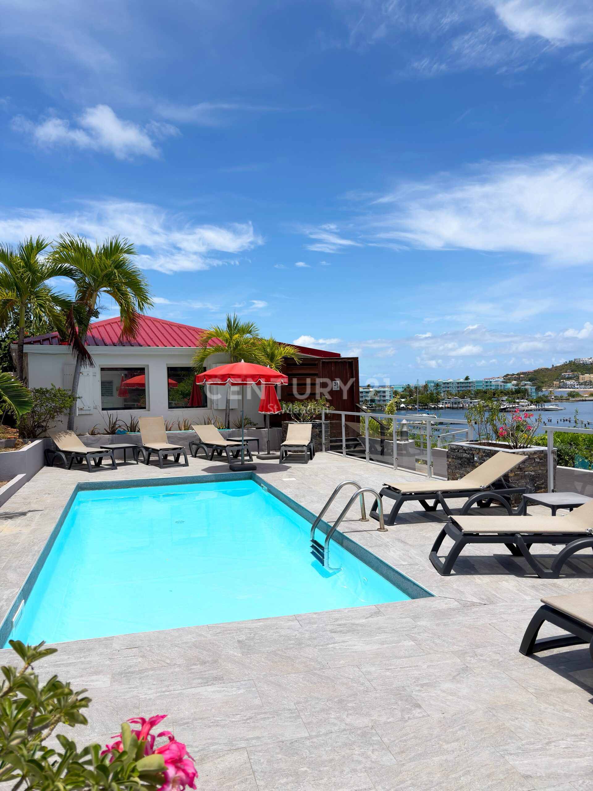 Charming Caribbean Bungalow with Panoramic Marina & Ocean Views in Oyster Pond for Sale