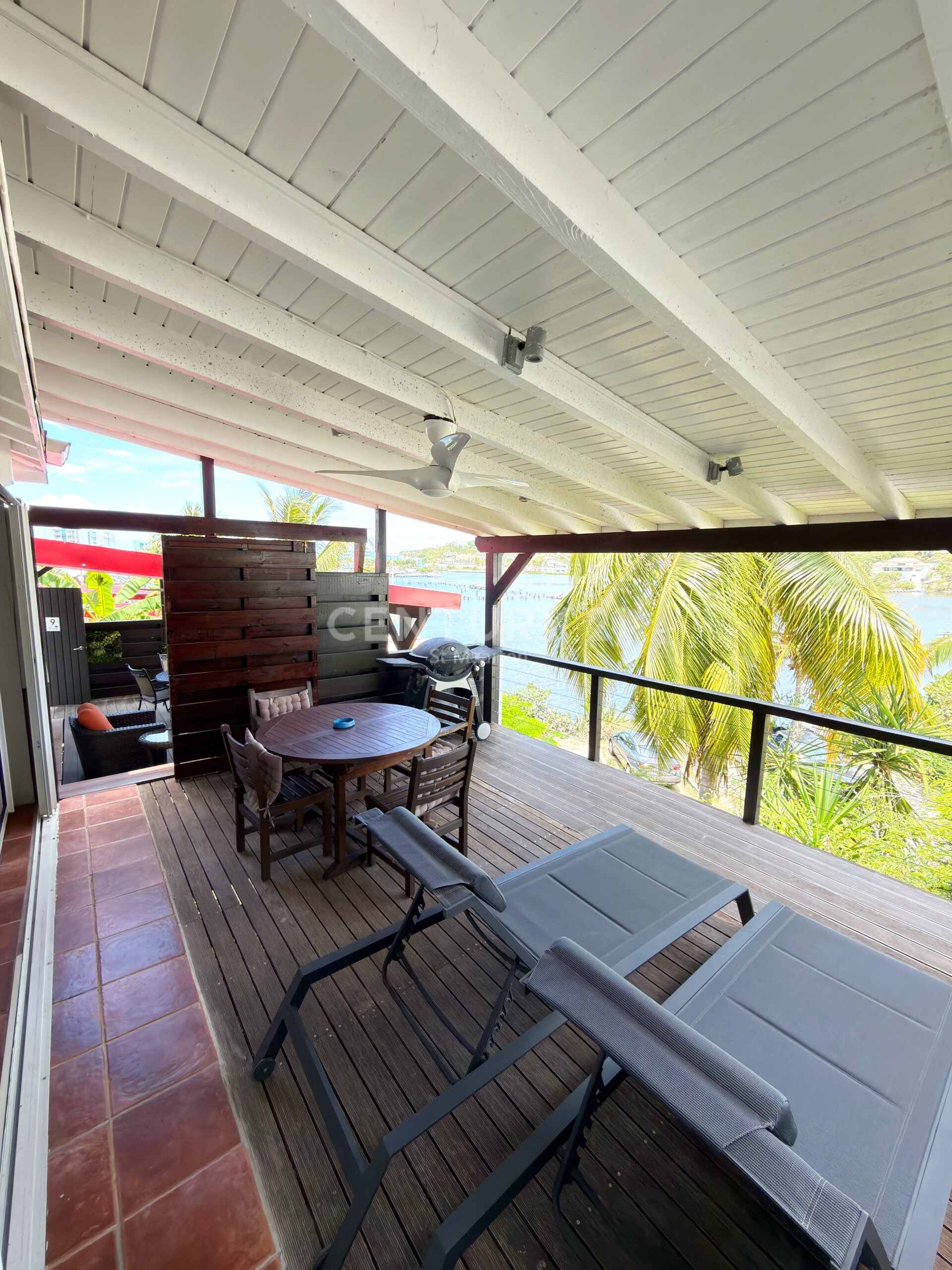 Charming Caribbean Bungalow with Panoramic Marina & Ocean Views in Oyster Pond for Sale